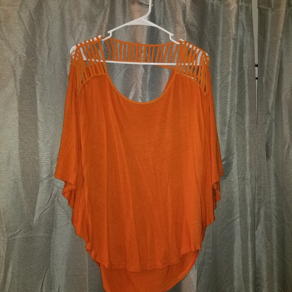 Vestique orange top